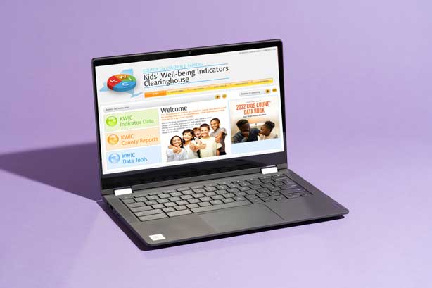 Laptop with NYS KWIC website image.